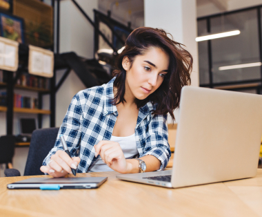 Female bookkeeper taking notes