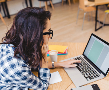 Female bookkeeper analyzing data